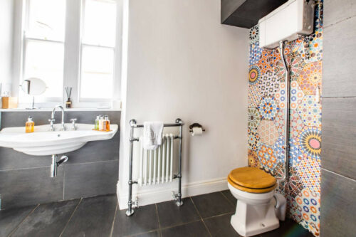Downstairs bathroom with wet room / shower