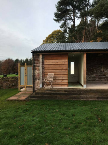 Outdoor shower overlooking Blencathra and the lakes